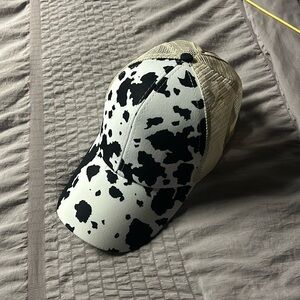 Cow print hat never worn